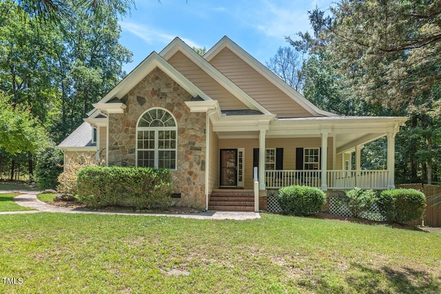 126 Captains Ct, Durham, NC 27712 - view of front of property featuring crawl space, stone siding, a porch, and a front yard