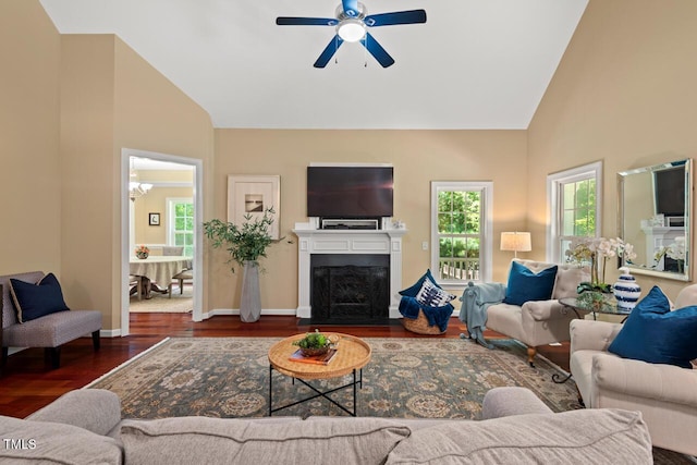 126 Captains Ct, Durham, NC 27712 - living area featuring healthy amount of natural light, high vaulted ceiling, ceiling fan, a fireplace with flush hearth, and wood finished floors