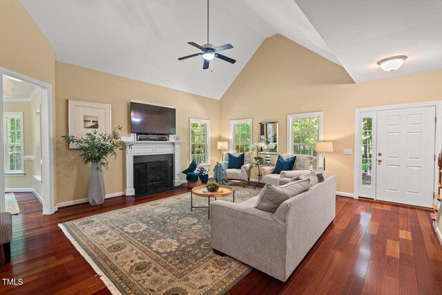126 Captains Ct, Durham, NC 27712 - living room with high vaulted ceiling, a ceiling fan, a fireplace with flush hearth, and dark wood-style floors