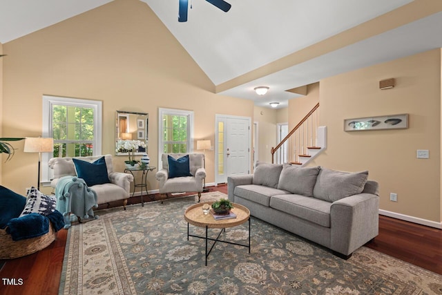 126 Captains Ct, Durham, NC 27712 - living room featuring wood finished floors, a ceiling fan, stairway, plenty of natural light, and high vaulted ceiling