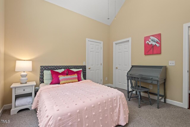 126 Captains Ct, Durham, NC 27712 - bedroom featuring carpet flooring and high vaulted ceiling