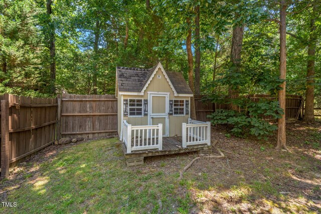 126 Captains Ct, Durham, NC 27712 - view of shed with a fenced backyard
