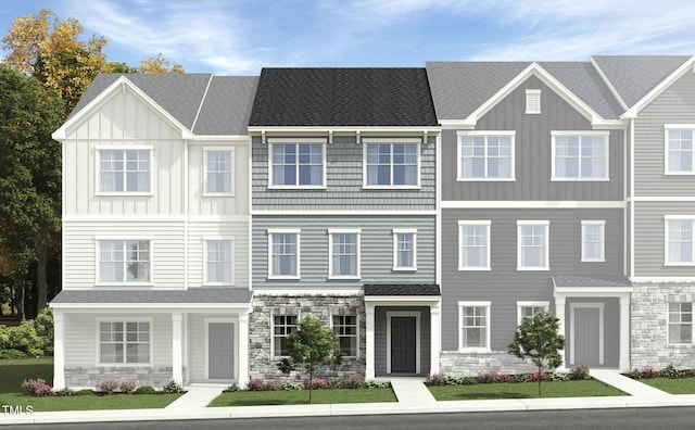 1426 Jay Rd, Knightdale, NC 27545 - townhome / multi-family property with stone siding and board and batten siding