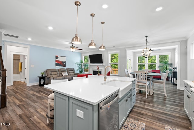 8341 Running Fern Way, Willow Springs, NC 27592 - kitchen featuring dishwasher, ornamental molding, light countertops, dark wood finished floors, and healthy amount of natural light