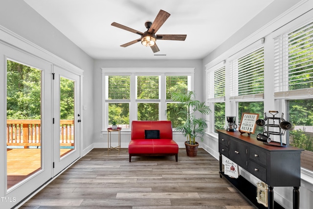 8341 Running Fern Way, Willow Springs, NC 27592 - sunroom with french doors, wood finished floors, and a deck
