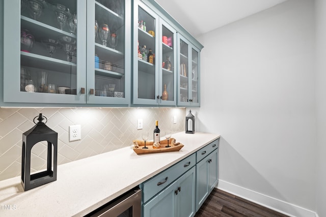 8341 Running Fern Way, Willow Springs, NC 27592 - bar featuring dark wood-style floors and decorative backsplash