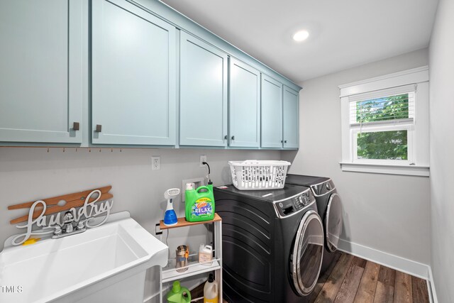 8341 Running Fern Way, Willow Springs, NC 27592 - laundry room with cabinet space, independent washer and dryer, and dark wood-type flooring
