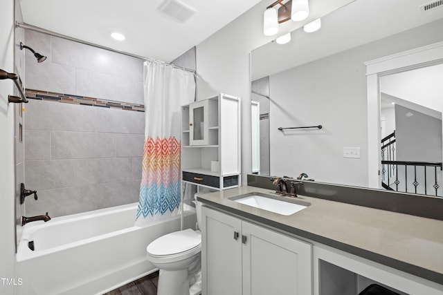 8341 Running Fern Way, Willow Springs, NC 27592 - bathroom with shower / bath combo with shower curtain, vanity, and wood finished floors