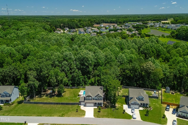 8341 Running Fern Way, Willow Springs, NC 27592 - aerial perspective of suburban area with a forest
