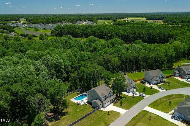 8341 Running Fern Way, Willow Springs, NC 27592 - aerial view of residential area featuring a heavily wooded area
