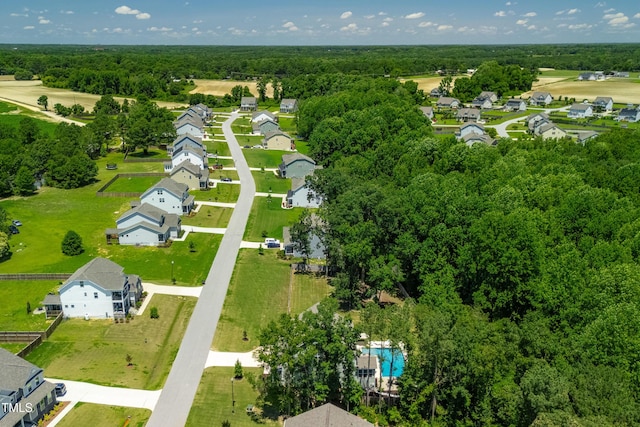 8341 Running Fern Way, Willow Springs, NC 27592 - aerial view of residential area with a pool and a forest