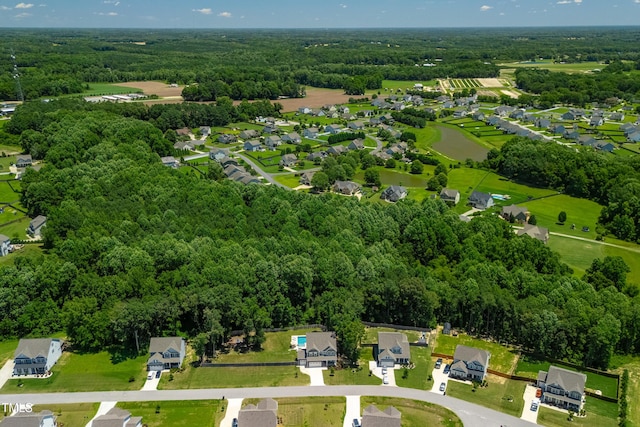 8341 Running Fern Way, Willow Springs, NC 27592 - aerial perspective of suburban area with a forest