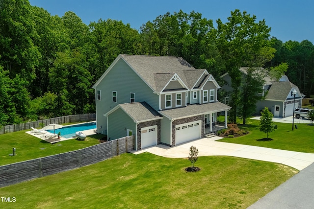 8341 Running Fern Way, Willow Springs, NC 27592 - craftsman-style house with concrete driveway, an attached garage, and a porch