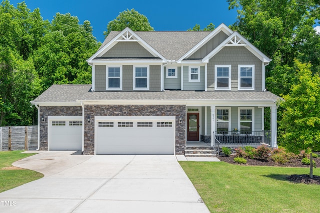 8341 Running Fern Way, Willow Springs, NC 27592 - craftsman house with a porch, driveway, a shingled roof, stone siding, and an attached garage