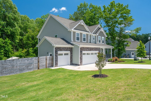 8341 Running Fern Way, Willow Springs, NC 27592 - craftsman inspired home with driveway, a garage, and stone siding
