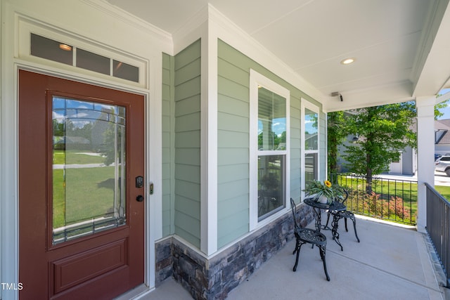 8341 Running Fern Way, Willow Springs, NC 27592 - property entrance with covered porch and stone siding