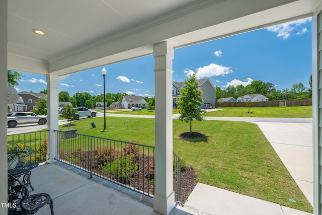 8341 Running Fern Way, Willow Springs, NC 27592 - porch featuring a residential view and a lawn