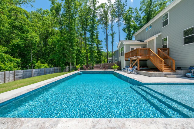 8341 Running Fern Way, Willow Springs, NC 27592 - view of pool with a deck, a fenced backyard, stairs, and a patio area