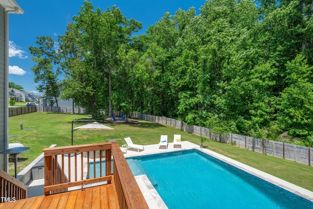 8341 Running Fern Way, Willow Springs, NC 27592 - view of pool with a wooden deck, a fenced backyard, and a patio area