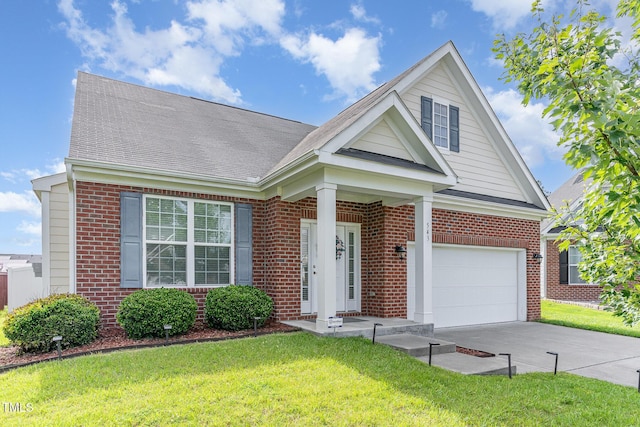 543 Callandale Ln, Durham, NC 27703 - view of front facade with brick siding, driveway, a front yard, a garage, and roof with shingles