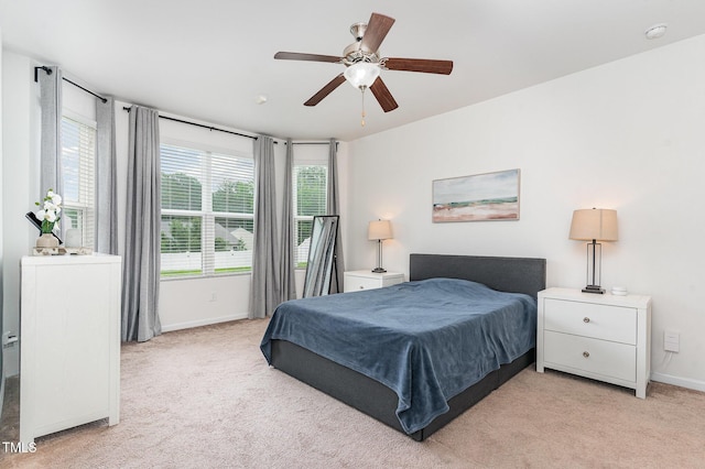 543 Callandale Ln, Durham, NC 27703 - bedroom featuring light carpet and a ceiling fan