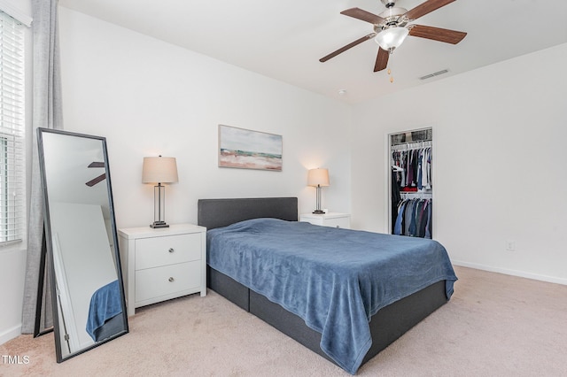 543 Callandale Ln, Durham, NC 27703 - bedroom featuring light colored carpet, a closet, and a ceiling fan