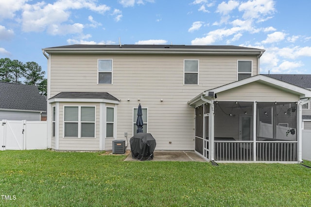543 Callandale Ln, Durham, NC 27703 - back of house with a gate and a sunroom