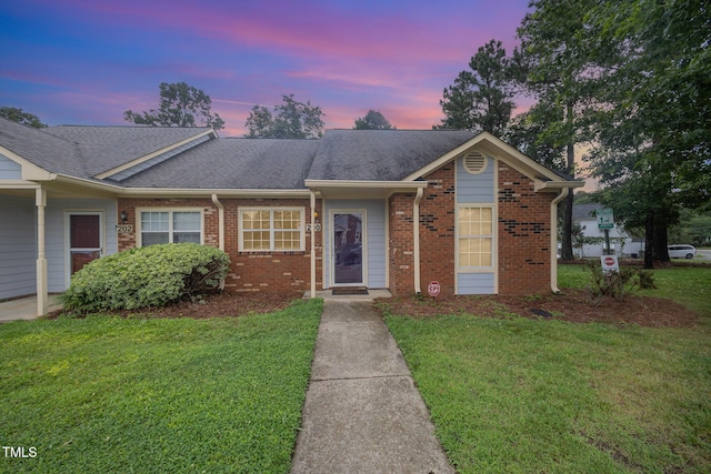 200 Old Spring Hill Ln, Fuquay Varina, NC 27526 - single story home with a front lawn, brick siding, and roof with shingles