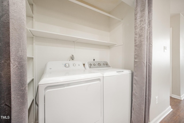 200 Old Spring Hill Ln, Fuquay Varina, NC 27526 - laundry room with wood finished floors and washer and clothes dryer