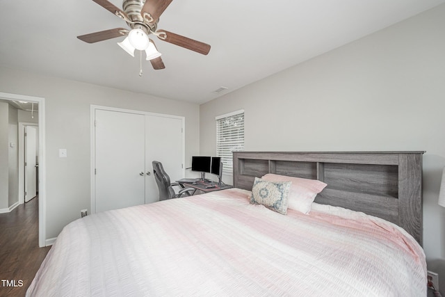 200 Old Spring Hill Ln, Fuquay Varina, NC 27526 - bedroom with attic access, dark wood-style flooring, a closet, and a ceiling fan