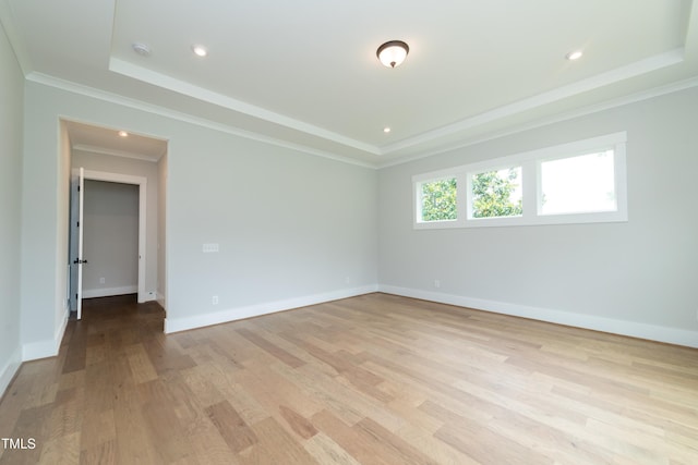 0 Bluestone Ct Lot 22R, Chapel Hill, NC 27514 - spare room with a tray ceiling, light wood finished floors, ornamental molding, and recessed lighting