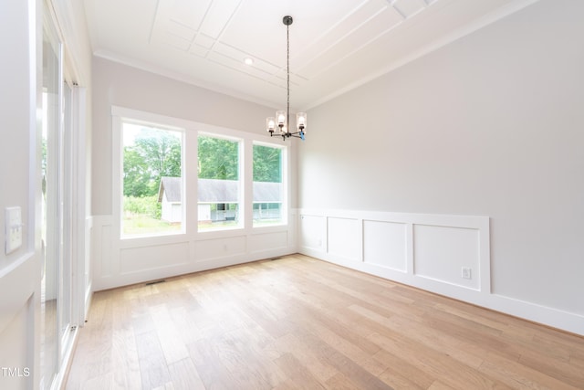 0 Bluestone Ct Lot 22R, Chapel Hill, NC 27514 - spare room featuring a decorative wall, a chandelier, light wood-style floors, and a wainscoted wall