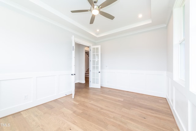 0 Bluestone Ct Lot 22R, Chapel Hill, NC 27514 - unfurnished room with a decorative wall, ceiling fan, ornamental molding, a wainscoted wall, and light wood-style floors