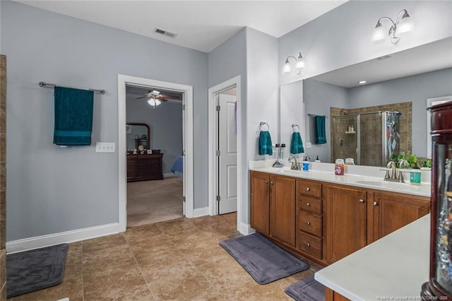 50 Turner Mathews Ct, Spring Lake, NC 28390 - full bath with double vanity, a shower stall, and a ceiling fan