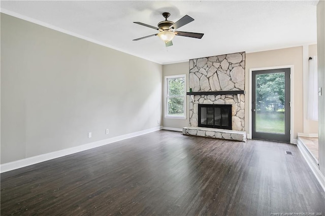 2012 Cobblestone Pl, Fayetteville, NC 28304 - unfurnished living room with plenty of natural light, wood finished floors, a fireplace, and crown molding