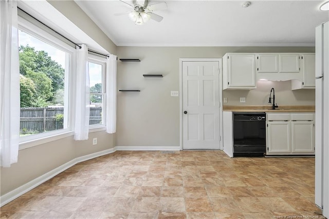 2012 Cobblestone Pl, Fayetteville, NC 28304 - kitchen featuring dishwasher, white cabinets, light countertops, ornamental molding, and ceiling fan