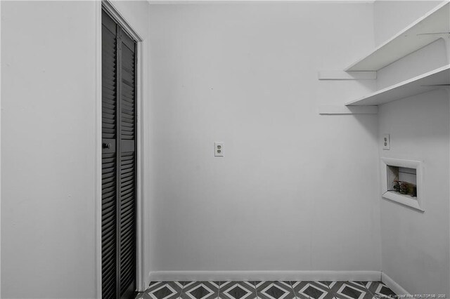 2012 Cobblestone Pl, Fayetteville, NC 28304 - laundry area with hookup for a washing machine and tile patterned floors