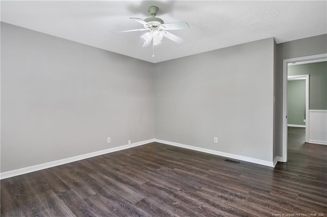 2012 Cobblestone Pl, Fayetteville, NC 28304 - spare room featuring a ceiling fan and dark wood finished floors