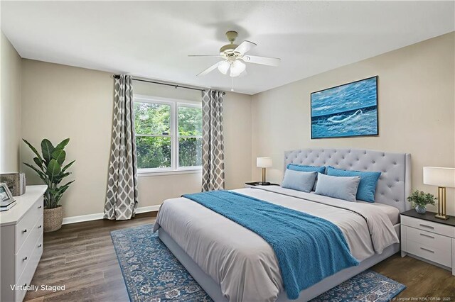 2012 Cobblestone Pl, Fayetteville, NC 28304 - bedroom featuring dark wood finished floors and a ceiling fan
