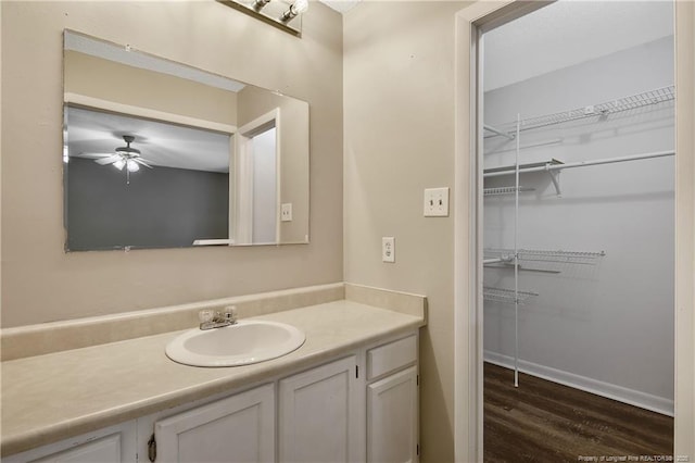2012 Cobblestone Pl, Fayetteville, NC 28304 - bathroom featuring vanity, ceiling fan, and wood finished floors