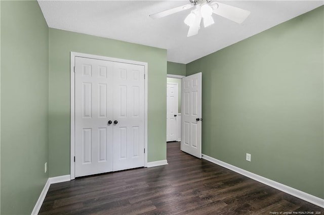 2012 Cobblestone Pl, Fayetteville, NC 28304 - unfurnished bedroom featuring dark wood-style floors, a closet, and ceiling fan