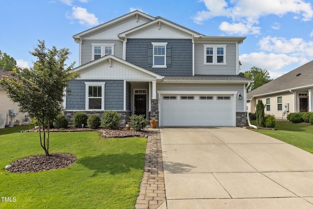 209 S Harrison Place Ln, Fuquay Varina, NC 27526 - craftsman-style home with stone siding, a garage, driveway, and a front lawn