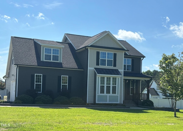 644 Wall Rd, Wendell, NC 27591 - view of front of home with board and batten siding, a shingled roof, and a porch