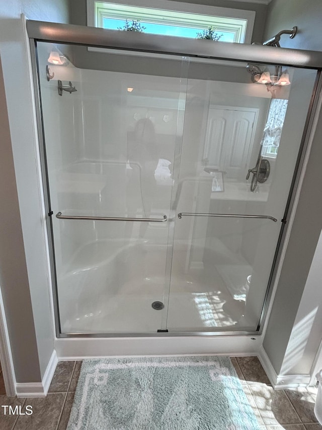 644 Wall Rd, Wendell, NC 27591 - bathroom with a shower stall and tile patterned floors