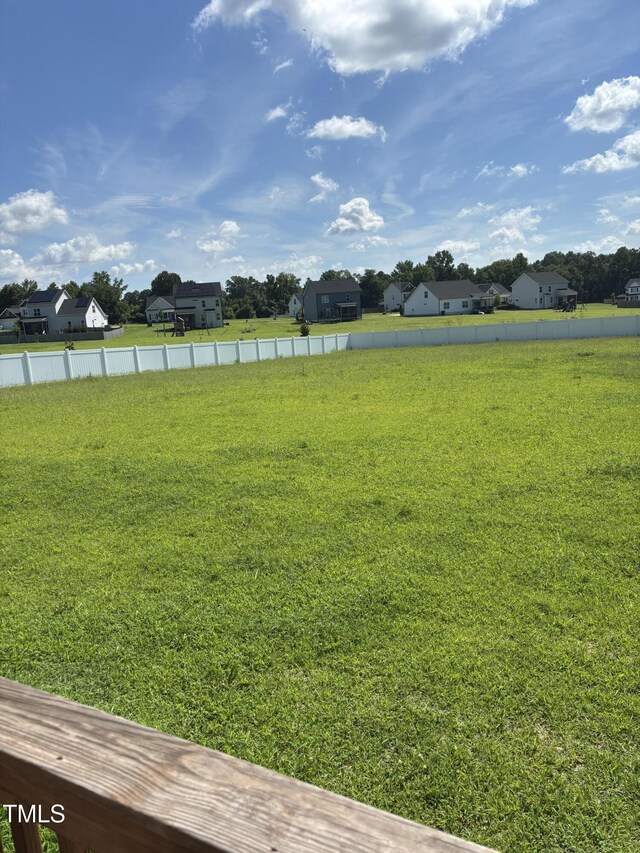 644 Wall Rd, Wendell, NC 27591 - view of green lawn featuring a residential view