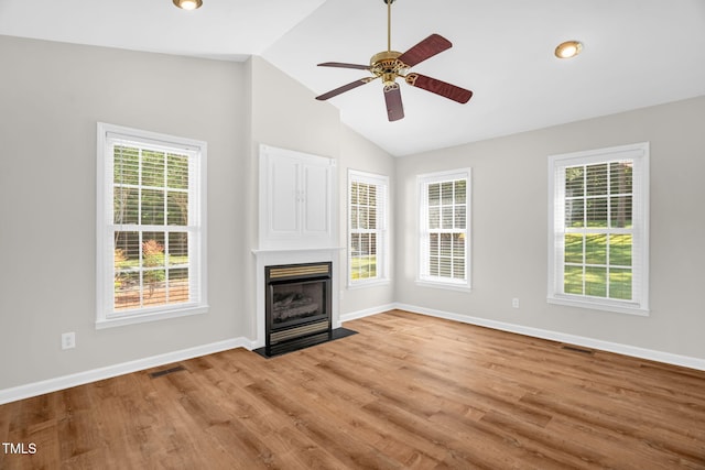 514 Lipscomb Grove Church Rd, Hillsborough, NC 27278 - unfurnished living room featuring ceiling fan, lofted ceiling, wood finished floors, and a fireplace with flush hearth