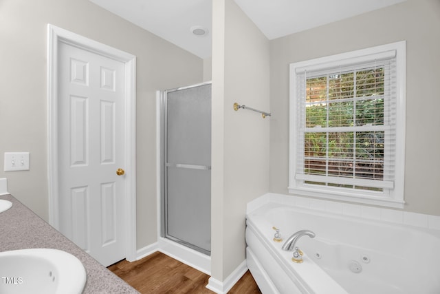 514 Lipscomb Grove Church Rd, Hillsborough, NC 27278 - full bathroom featuring a shower stall, a jetted tub, wood finished floors, and double vanity