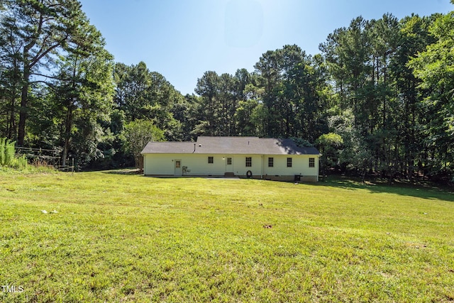 514 Lipscomb Grove Church Rd, Hillsborough, NC 27278 - back of property with a lawn, crawl space, and a wooded view