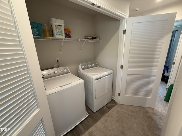 4500 Black Drum Dr, Raleigh, NC 27616 - laundry room featuring washer and clothes dryer and wood finished floors