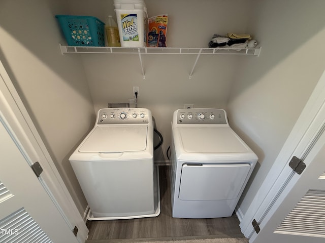 4500 Black Drum Dr, Raleigh, NC 27616 - washroom featuring separate washer and dryer and wood finished floors